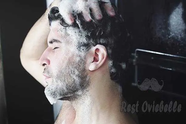 Man washing his hair. best beard shampoo