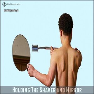 Holding The Shaver and Mirror