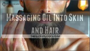massaging oil into skin and hair