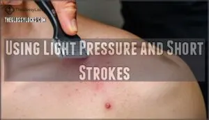 using light pressure and short strokes
