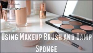 using makeup brush and damp sponge