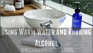 using warm water and rubbing alcohol