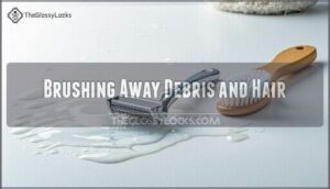 brushing away debris and hair