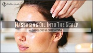 massaging oil into the scalp