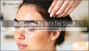 massaging oil into the scalp