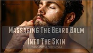 massaging the beard balm into the skin