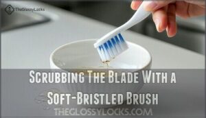 scrubbing the blade with a soft-bristled brush