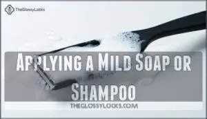 applying a mild soap or shampoo