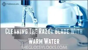cleaning the razor blade with warm water