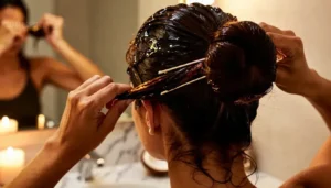 securing hair with a bun or topknot securing hair with a bun or topknot