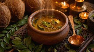 warm coconut oil with curry leaves warm coconut oil with curry leaves